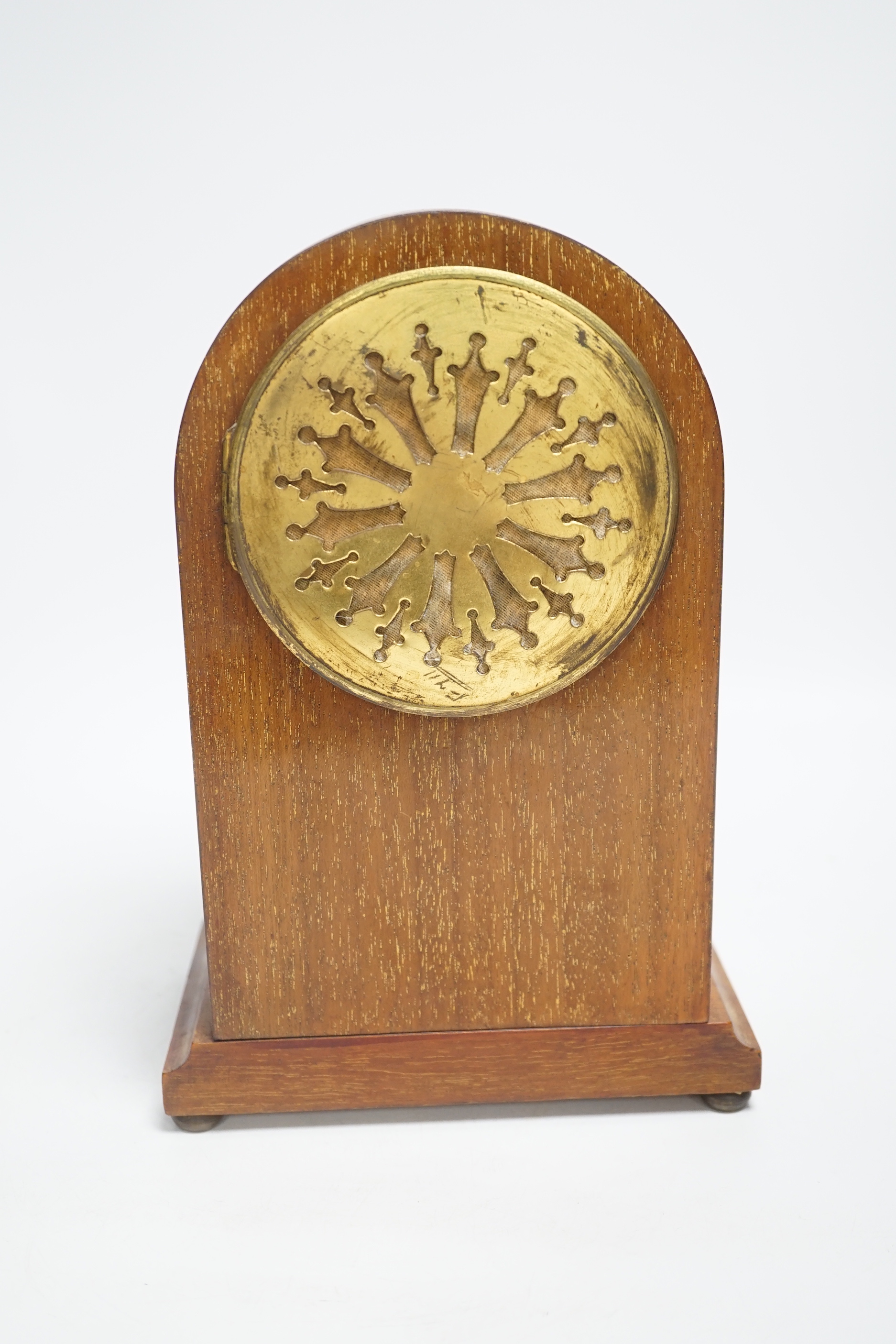 An Edwardian marquetry mantel clock with enamel dial, the case inlaid with swags, 26cm high